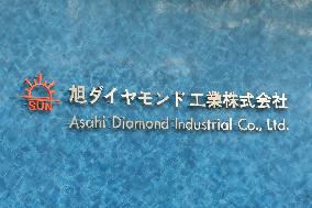 Asahi Diamond Industry signboard and logo